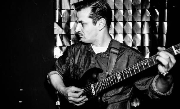 istock The bass guitar player. 2162659064