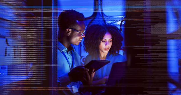 istock Man, woman and tablet with overlay for technology, maintenance or night data center or futuristic. Teamwork, digital information and cloud computing with app, network programming or problem solving 2162659681