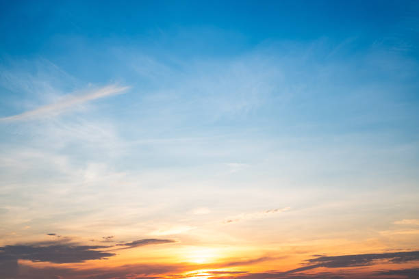 istock Beautiful , luxury soft gradient orange gold clouds and sunlight on the blue sky perfect for the background, take in everning,Twilight, Large size, high definition landscape photo 2162659794