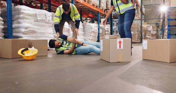 istock Fail, fall and boxes with man in warehouse for delivery, distribution or supply chain logistics. Accident, injury or mistake and person on floor of plant with stock for ecommerce, retail or safety 2162659931