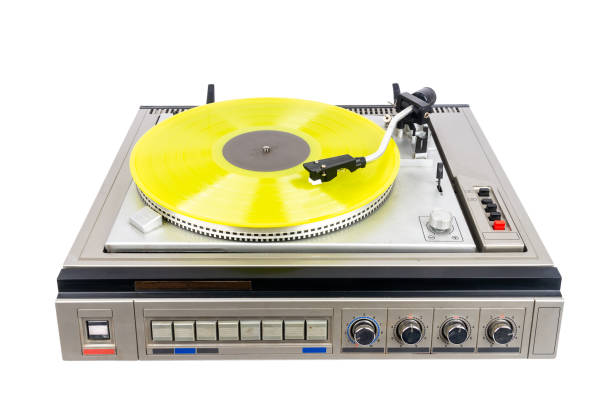 istock Vintage turntable record player with yellow vinyl 2162661216