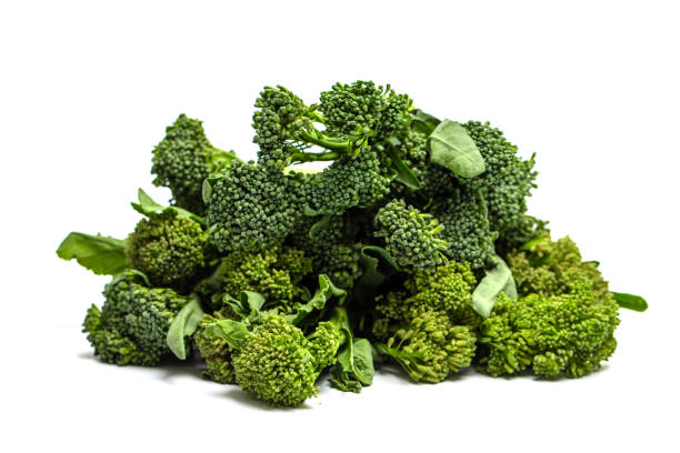Fresh green broccoli florets isolated on white background