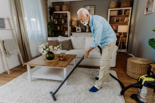 istock Vacuuming in the living room 2162669222