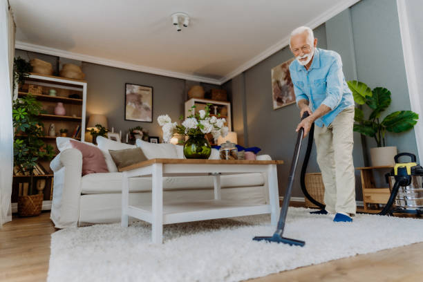 istock Vacuuming in the living room 2162669229