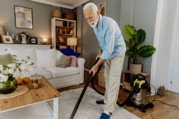 istock Vacuuming in the living room 2162669232