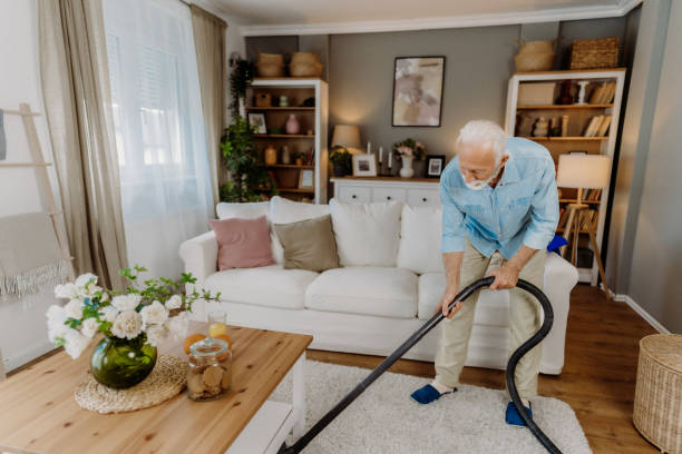 istock Vacuuming in the living room 2162669276