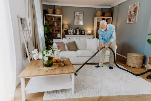 istock Vacuuming in the living room 2162669280
