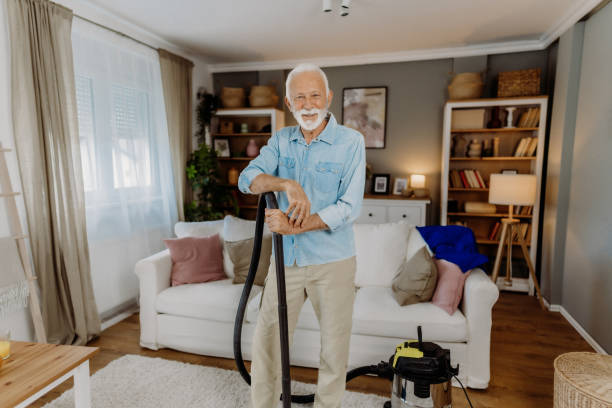 istock Vacuuming in the living room 2162669308