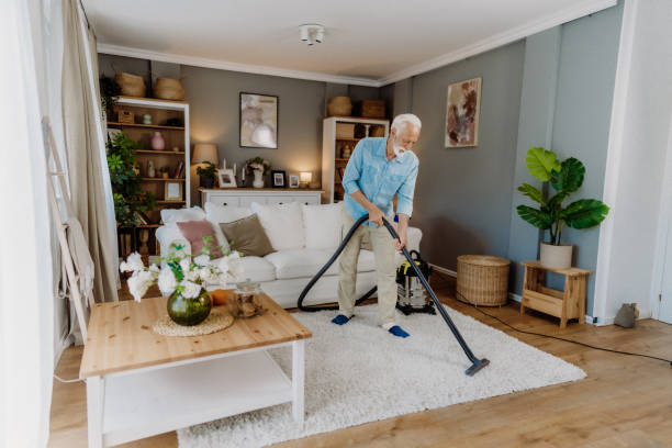 istock Vacuuming in the living room 2162669346