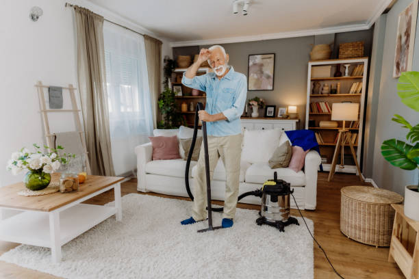 istock Vacuuming in the living room 2162669353