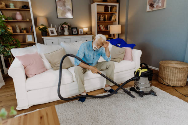 istock Vacuuming in the living room 2162669377