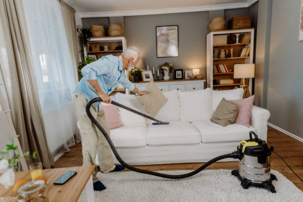 istock Vacuuming in the living room 2162669490
