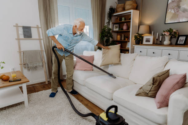 istock Vacuuming in the living room 2162669507