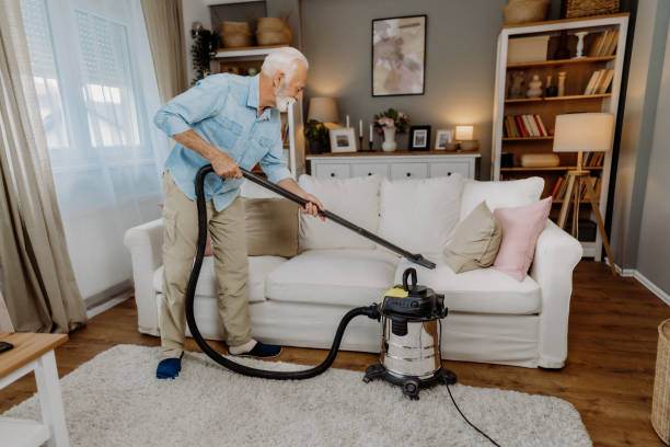 istock Vacuuming in the living room 2162669508