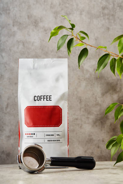 Shelves lined with sleek black coffee bags, showcasing a selection of premium coffee.