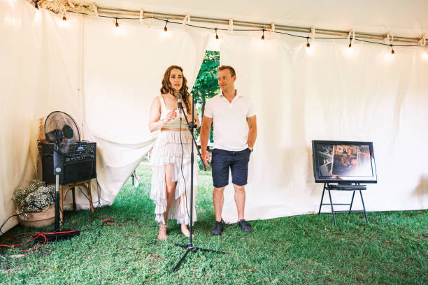 istock Bride and groom speaking at the wedding party dinner 2162677767