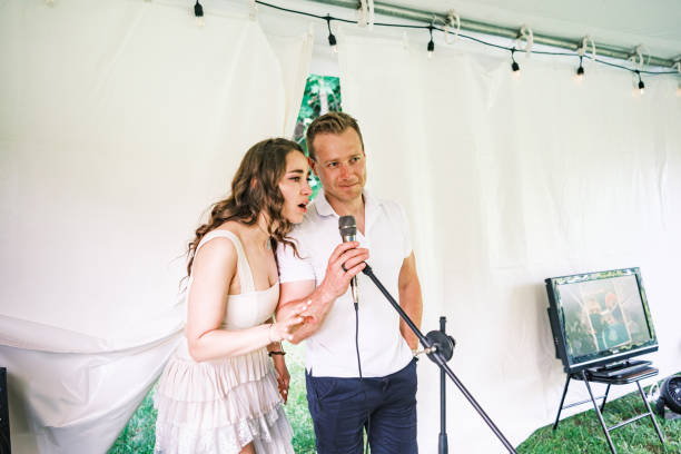 istock Bride and groom speaking at the wedding party dinner 2162677786