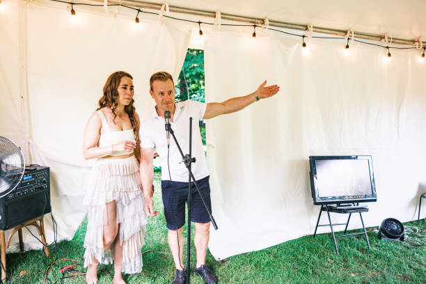 istock Bride and groom speaking at the wedding party dinner 2162677797