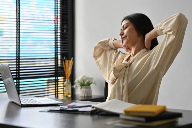 istock Businesswoman twisted on self due to office work. 2162678299