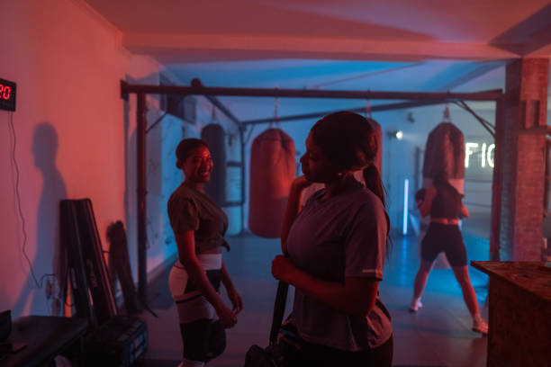 istock Young female boxers getting ready for training in box club 2162685777