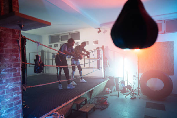 istock Young female boxers resting after training 2162687183