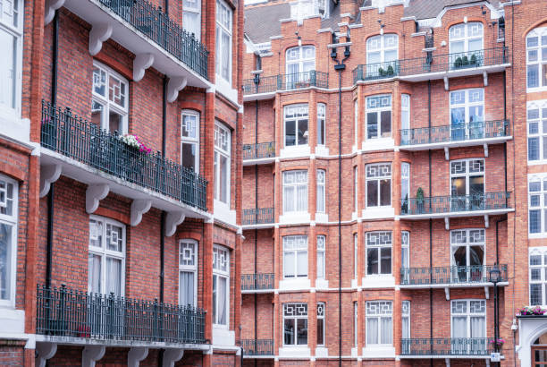 Prestigious flats with balconies in elegant brick built Victorian properties in central London's Marylebone district.