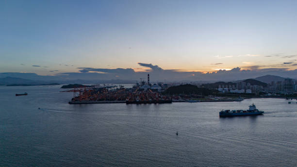 istock Cargo terminal on the sea at dusk 2162702075