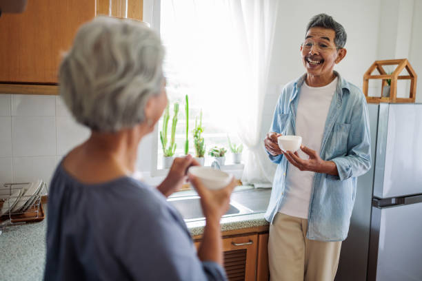 istock Senior Couple in Kitchen at Home 2162703987