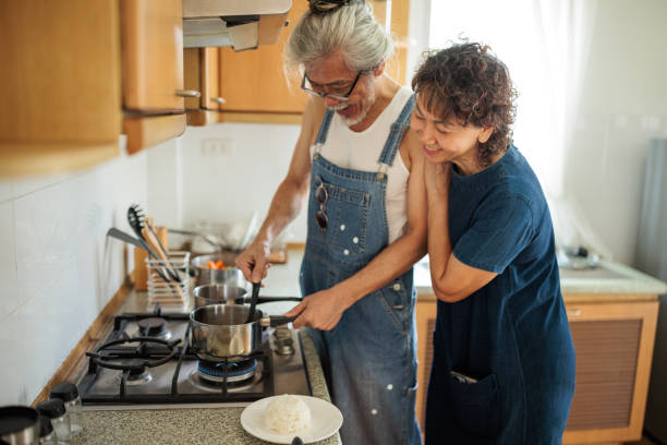istock Elderly Couple Cooking a Meal 2162704686