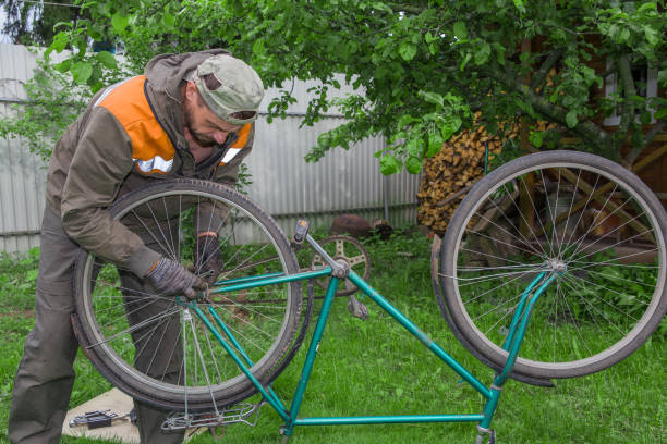 istock A man is repairing an old bicycle 2162705148