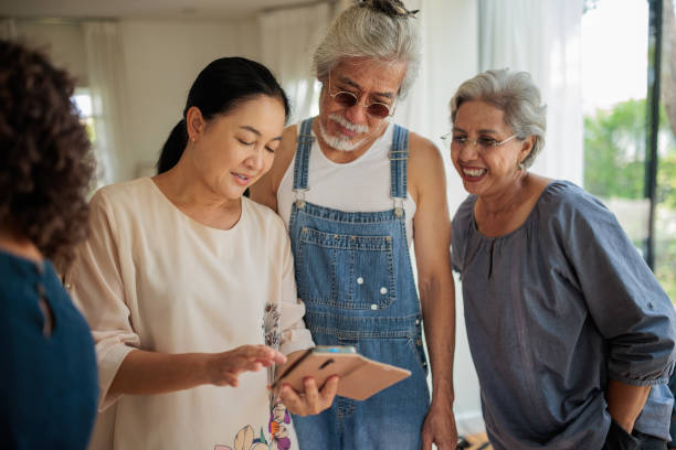 istock Modern elderly friends at home 2162705521