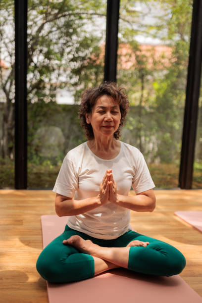 istock Thai woman meditating 2162706096