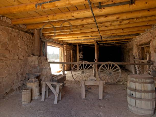 istock Farm equipment and barrel in barn at Hubbell trading post 2162709270