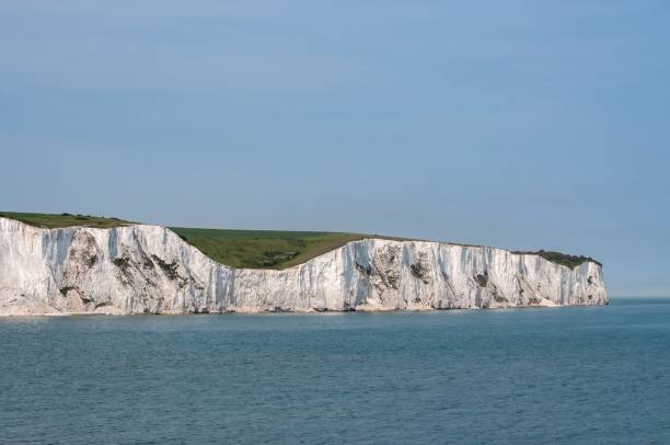 istock english chalk cliffs with calm sea and blue sky 2162711409