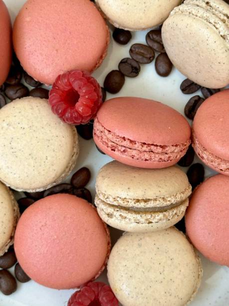 istock Macarons and raspberries and coffee beans 2162713887
