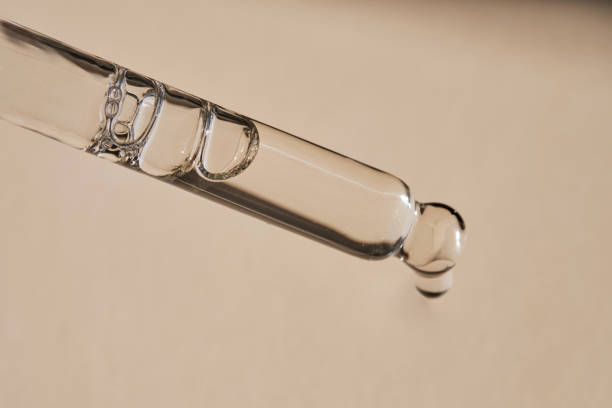 istock Pipette with serum on a beige background. 2162719934