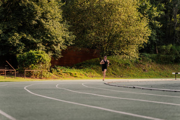 Expert runner using the inside lane of the track during the 400m sprint race