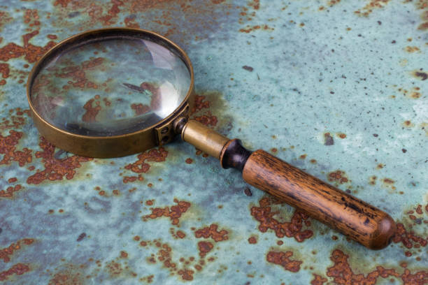 istock Vintage magnifying glass on metal rusty background, 2162722295
