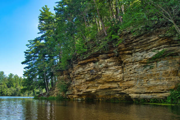 istock Rocky Cliff Beside Lake 2162724616