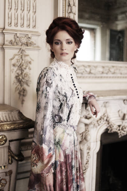 istock woman posing next to the fireplace 2162727686