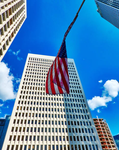 istock Low Angle view of skyscrapers against blue clear sky 2162729407