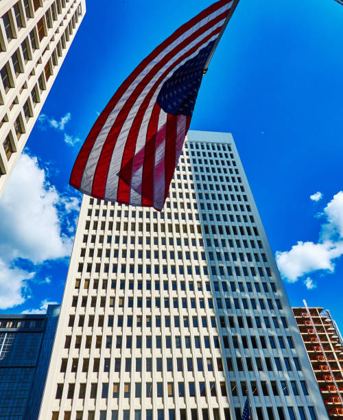 istock Low Angle view of skyscrapers against blue clear sky 2162729408