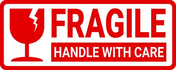 istock sticker fragile handle with care, red fragile warning label with broken glass symbol, this side up sign 2162740606