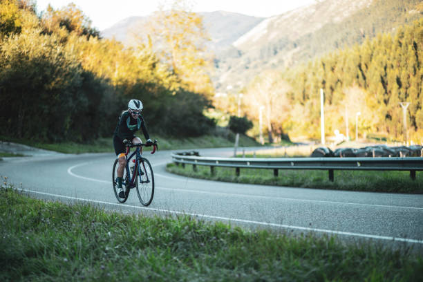 istock Woman cyclist training on the road 2162748230
