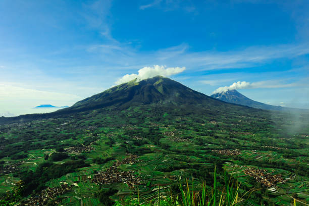 istock the mountains look green against the blue sky 2162749111
