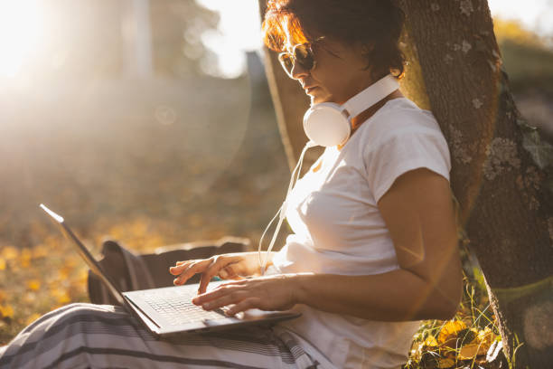 istock Woman working in autumn nature 2162753284