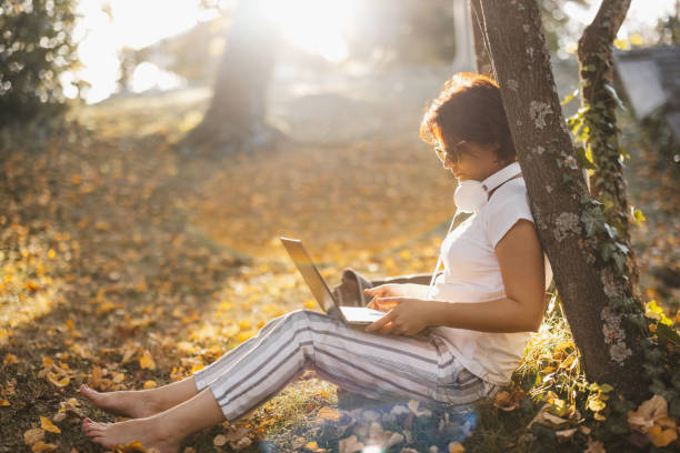 istock Woman working in autumn nature 2162753465