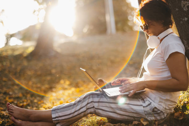 istock Woman working in autumn nature 2162753675
