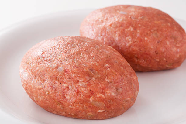 Pork schnitzel with bread - white background