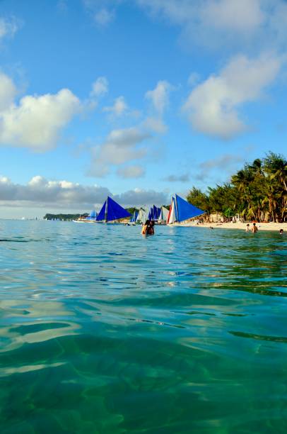 Boracay Island, beach scenes from this well known island in the Philippines. Boracay is a small island famous for it's White Beach which is the on the main strip. Around the island are other smaller beaches that are also white sand and clear water.